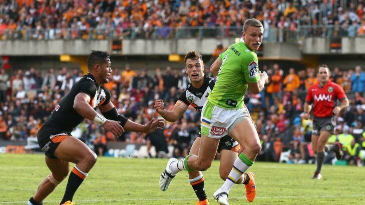 SYDNEY, AUSTRALIA - APRIL 19: Jack Wighton of the Raiders breaks through the Tigers defence during the round seven NRL match between the Wests Tigers and the Canberra Raiders at Leichhardt Oval on April 19, 2015 in Sydney, Australia.  (Photo by Cameron Spencer/Getty Images) Photo: Cameron Spencer