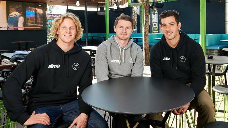 Crows trio: Taylor Walker (right) with Rory Sloane and Patrick Dangerfield at the Adelaide pub  they part-own. Photo: Supplied