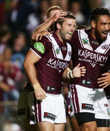 Good buy: Sea Eagles utilty Blake Leary is congratulated after scoring against Melbourne earlier this year. Photo: Matt King