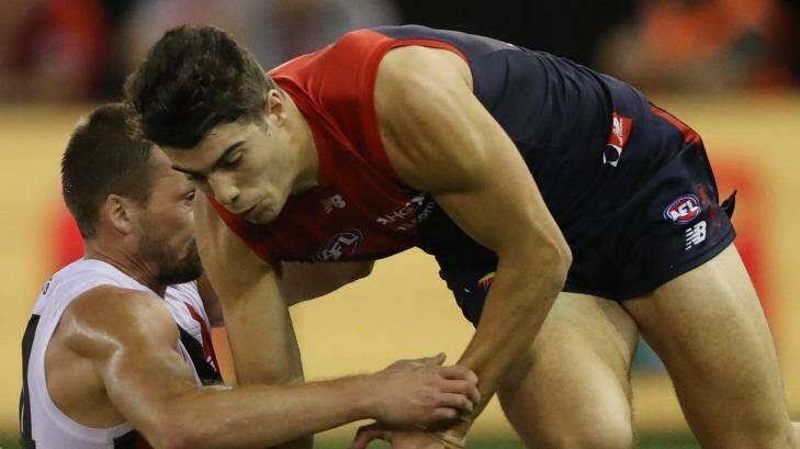Demon Christian Petracca looks to gather the ball.