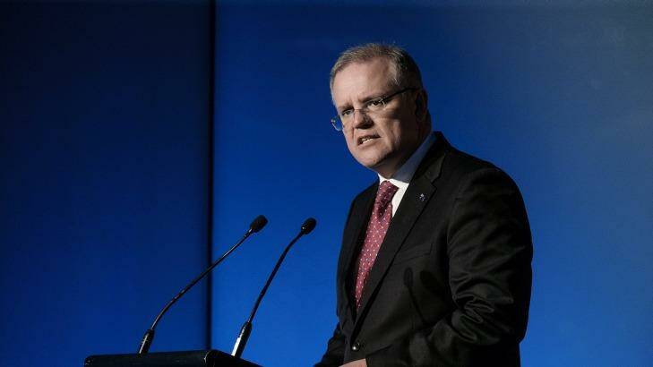 Treasurer Scott Morrison says changes are needed to Australia's tax system to increase the incentive for people to work more. Photo: Luis Ascui