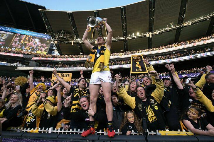 AFL Grand Final Adelaide Crows v Richmond Tigers Jack Riewoldt & cup in the tigers  cheer squad fence MCG 30/09/2017 Picture:Wayne Ludbey 