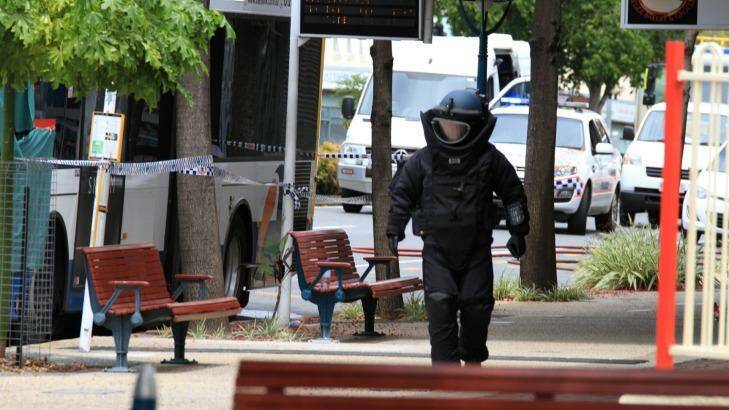 The bomb squad was called in to search the bus. Photo: Jorge Branco