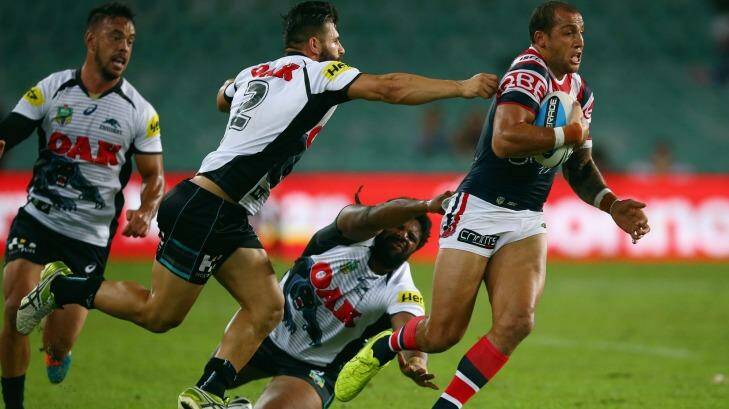 Ferguson makes a break on his way to two tries in the Roosters' win over Penrith last week.  Photo: Mark Kolbe