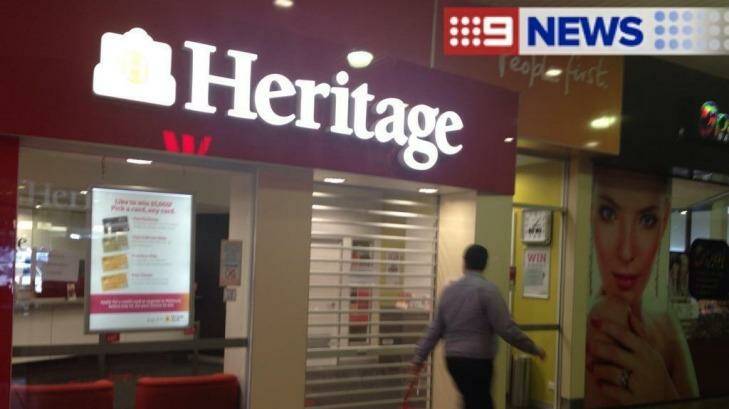 Police are searching for the man who robbed the Heritage Bank at Nerang on Friday afternoon. Photo: Nine News Brisbane