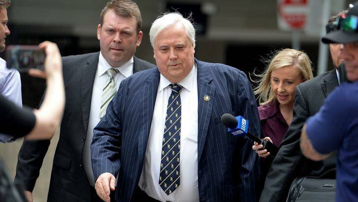 Clive Palmer arrives at the Federal Court in Brisbane on Thursday. Photo: Bradley Kanaris