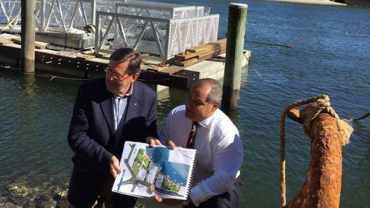 Waterways Board chairman Gary Baildon and Gold Coast mayor Ton Tate unveil the new river plan at Nerang River at Surfers Paradise. Photo: Supplied