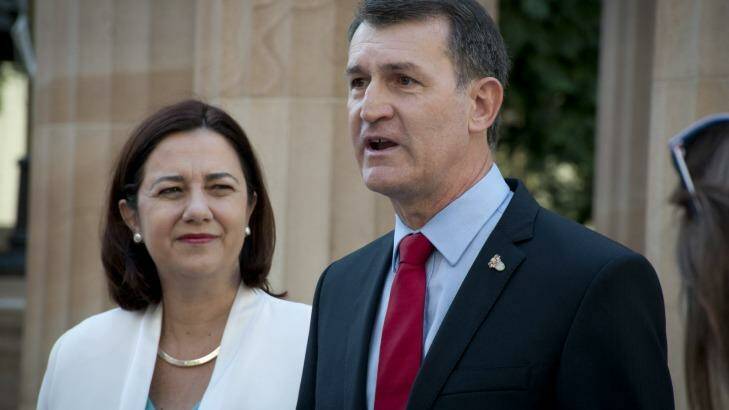 Lord Mayor Graham Quirk and Premier Annastacia Palaszczuk talk to reporters after Brisbane's eternal flame is returned to the Shrine of Remembrance in Anzac Square. Photo: Robert Shakespeare
