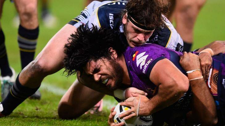 Unstoppable force: Tohu Harris touches down for the Storm. Photo: Getty Images 