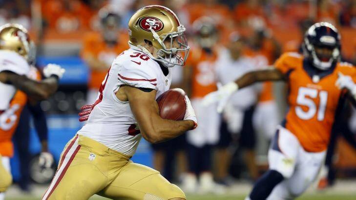 Making the most of his opportunity: San Francisco 49ers rookie Jarryd Hayne returns a kickoff during the second half of an NFL preseason football game against the Denver Broncos in Denver. Photo: Joe Mahoney