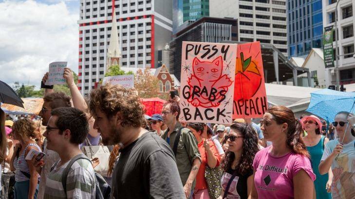 Hundreds braved a hot Brisbane morning to protest against the inauguration of Donald Trump. Photo: Tammy Law