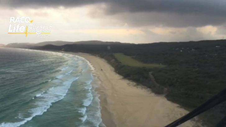 The RACQ LifeFlight Rescue helicopter conducted an extensive search on Saturday along the south-east Queensland coast, but found no trace of the missing trawler. Photo: RACQ LifeFlight Rescue