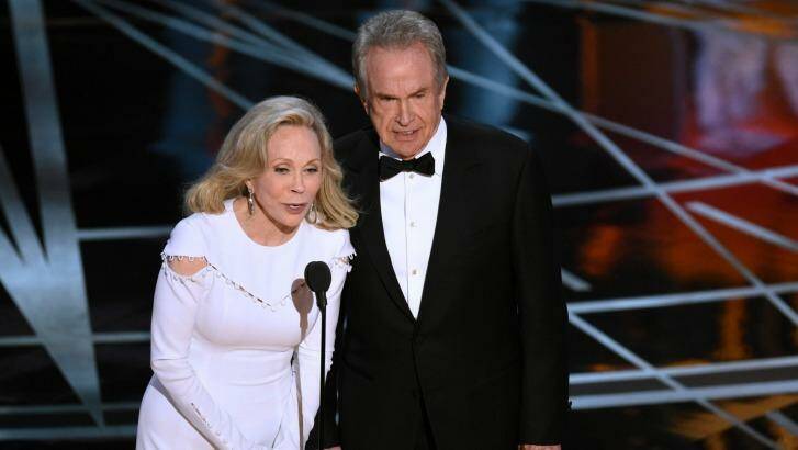 And the winner isn't: Faye Dunaway, left, and Warren Beatty present the award for best picture to the wrong film. Photo: Chris Pizzello