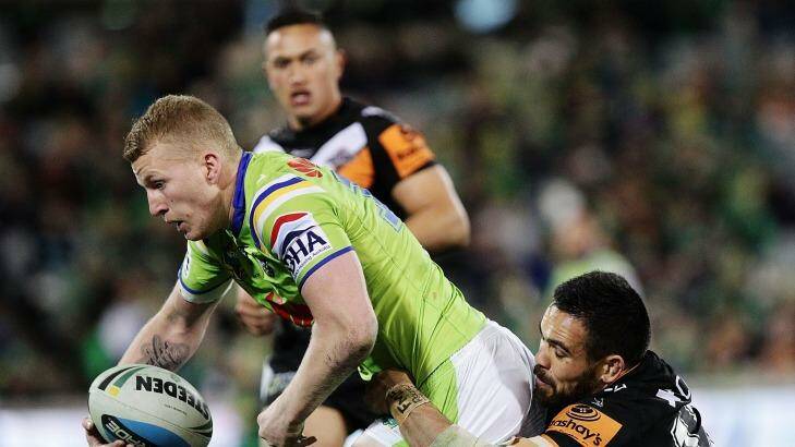 CANBERRA, AUSTRALIA - AUGUST 10:  Mitchell Barnett of the Raiders is tackled during the round 22 NRL match between the Canberra Raiders and the Wests Tigers at GIO Stadium on August 10, 2015 in Canberra, Australia.  (Photo by Stefan Postles/Getty Images) Photo: Stefan Postles