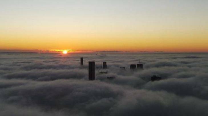 Fog blankets Brisbane on Thursday morning. Photo: Penny Dahl/Australian Traffic Network