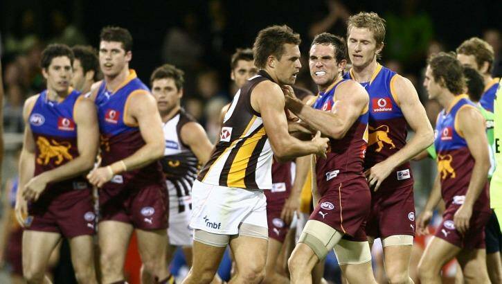 The Hawks and Lions tussle during their last Gabba clash in 2008. Photo: Paul Harris