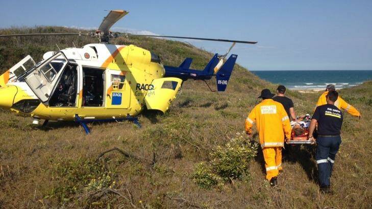 Crash victim airlifted from Fraser Island. Photo: RACQ CareFlight Rescue