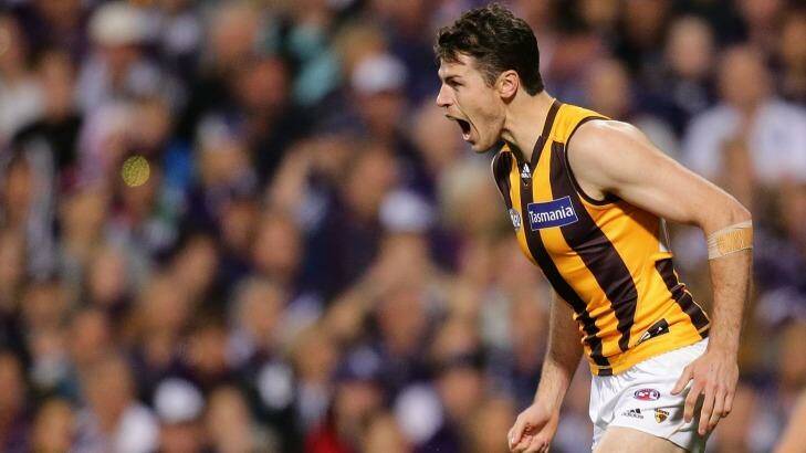 Hawthorn's Isaac Smith somehow drew an off-the-ball free kick when he ran into Hayden Ballantyne at jogging pace. Photo: AFL Media/Getty Images