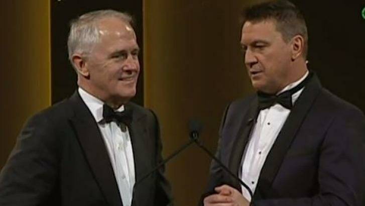 PM Malcolm Turnbull and Tony Squires ride out an awkward moment at the Dally M awards. Photo: Fox Sports