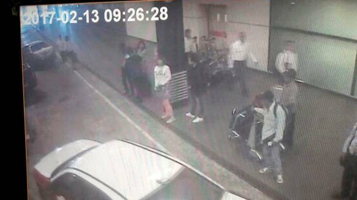 CCTV from Kuala Lumpur airport shows one of the women, centre in white, arrested in connection with Kim Jong-nam's death. Photo: Star TV/AAP