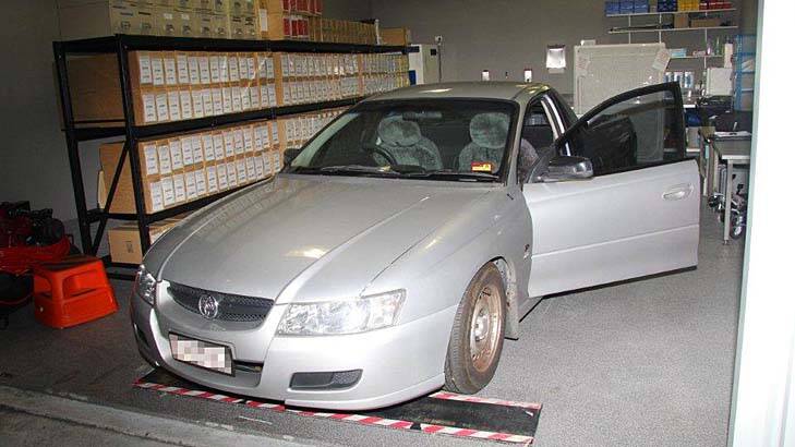 Police found a steel safe hidden behind the front passenger seat of this seized Holden ute. Photo: Supplied