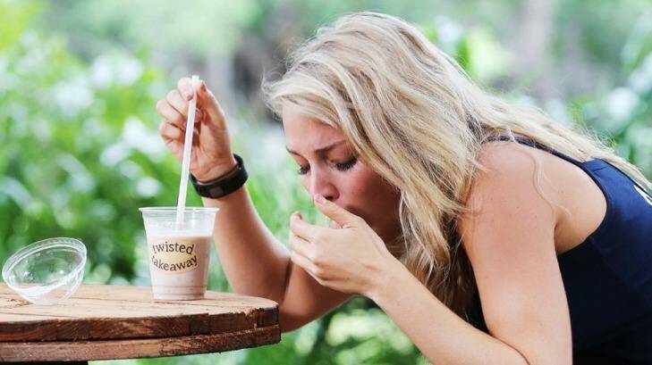 Anna Heinrich courageously consumes stomach-churning 'takeaway' during her Tucker Trial challenge. Photo: Network Ten