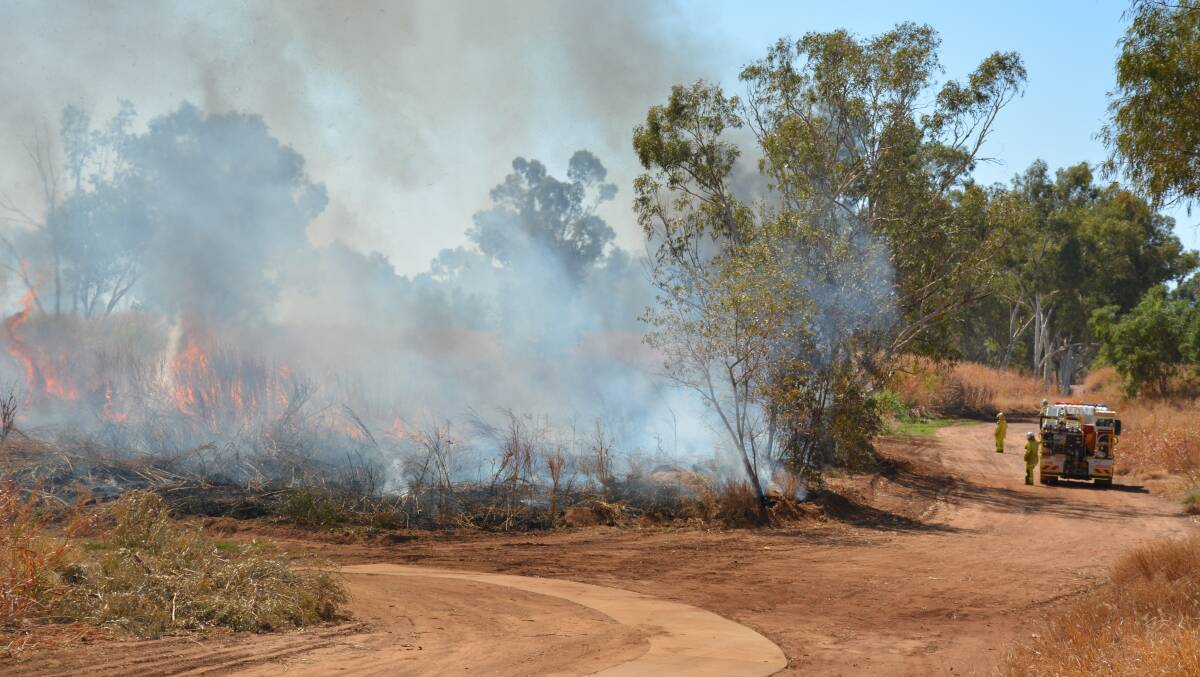 QFES and Rural Fire Brigade units burn the riverbed. Photo: Chris Burns 