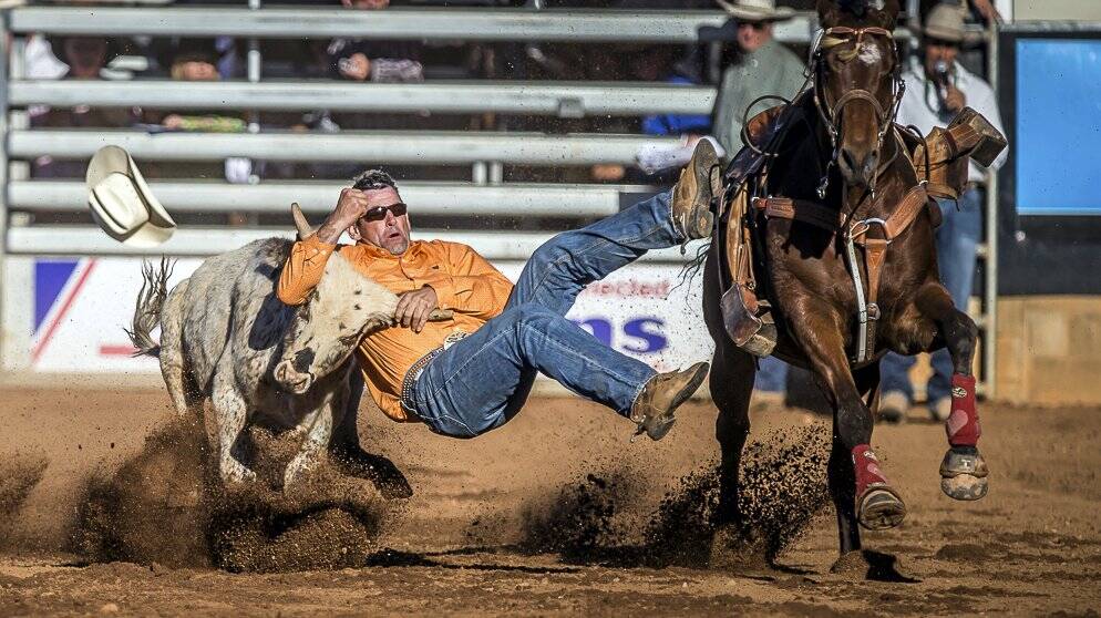 Rodney Reynolds in the steer wrestling. Photo: Stephen Mowbray.