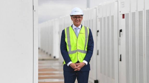 All smiles now: SA Premier Jay Weatherill tours the new Tesla battery site at the start of December. Photo: AAP
