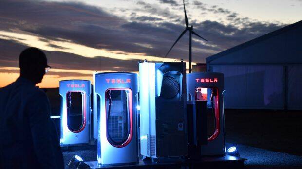 A Tesla car charging station at the wind and solar battery plant outside Jamestown in South Australia.  Photo: AAP
