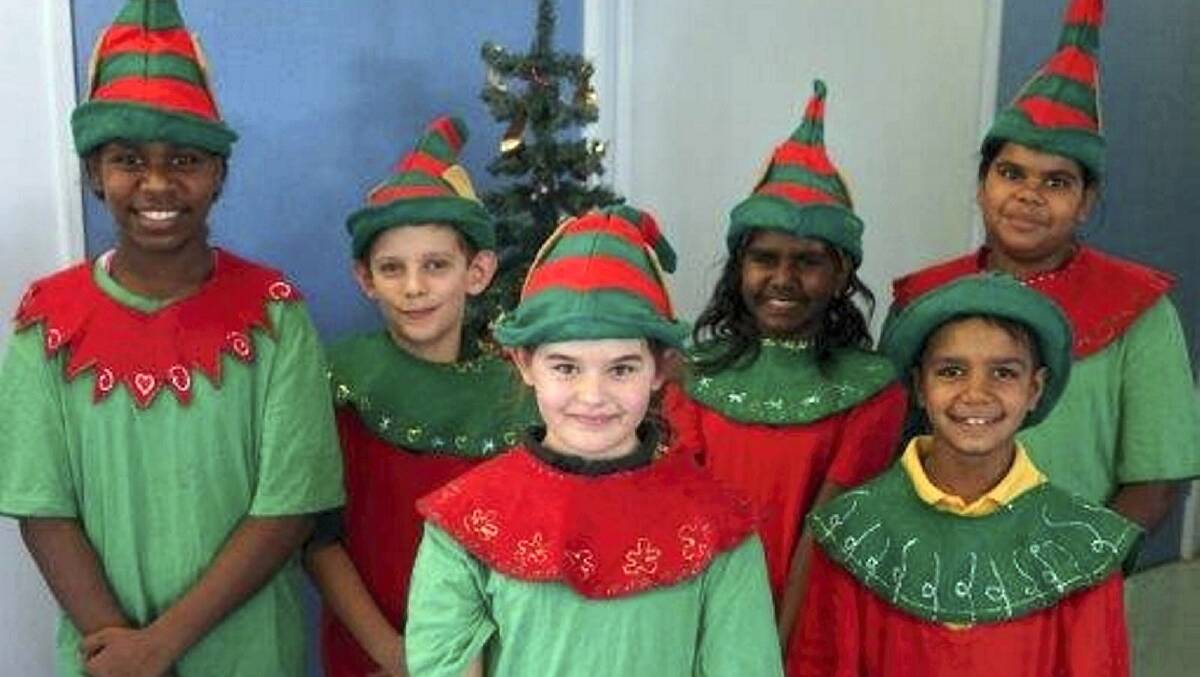 CAROLS CAPERS:  Healy State School elves (back row)  Mya Wilson, Aden Causerano,  Shenyle Limerick and Aaliyah Fisher. Front row: Justice Toth and Zekarn Rankin.
