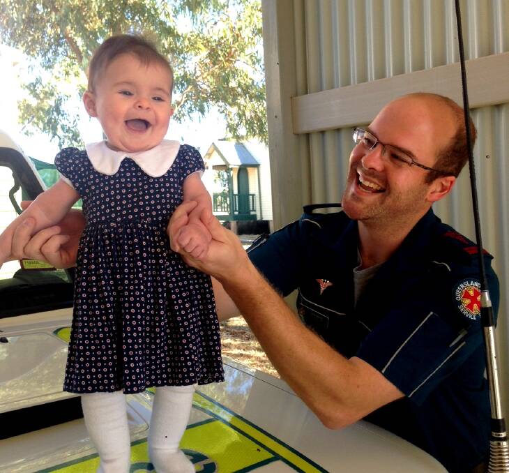 FATHER’S PRIDE: Julia Creek paramedic Sam Brind and his six-month-old daughter Evangeline will spend their first Father’s Day together this Sunday. 