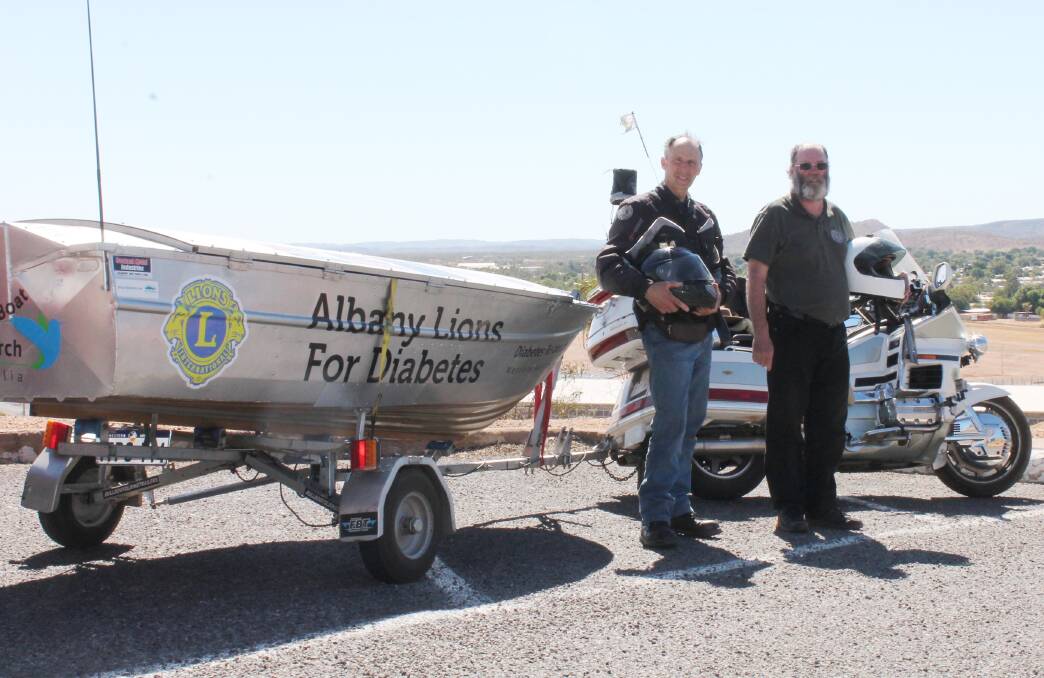 HOPE IN A BOAT: Albany Lions Club riders Raymond Cowcill and Glen Hurst will spend the night in Mount Isa before heading off to Cloncurry to raise money to find a cure for diabetes. – Picture: HAILEY RENAULT/8223