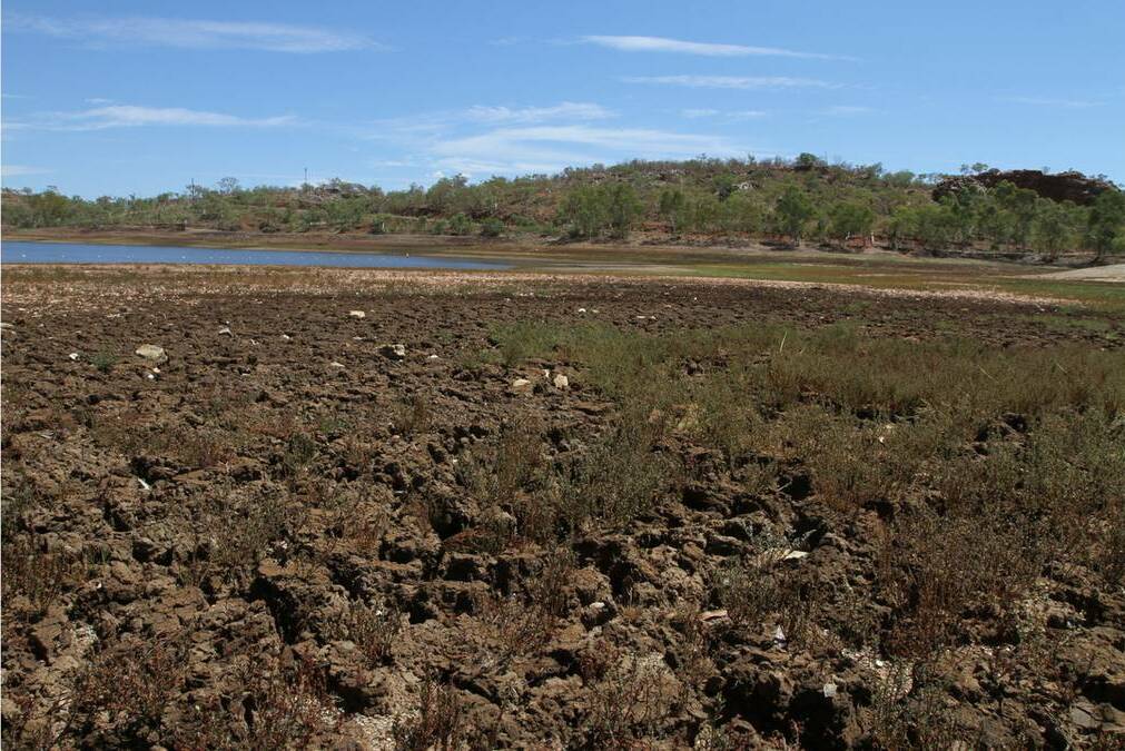 Mount Isa residents can now water their gardens and lawns at earlier hours of the night. Pictured is Lake Moondarra during the drought last year.