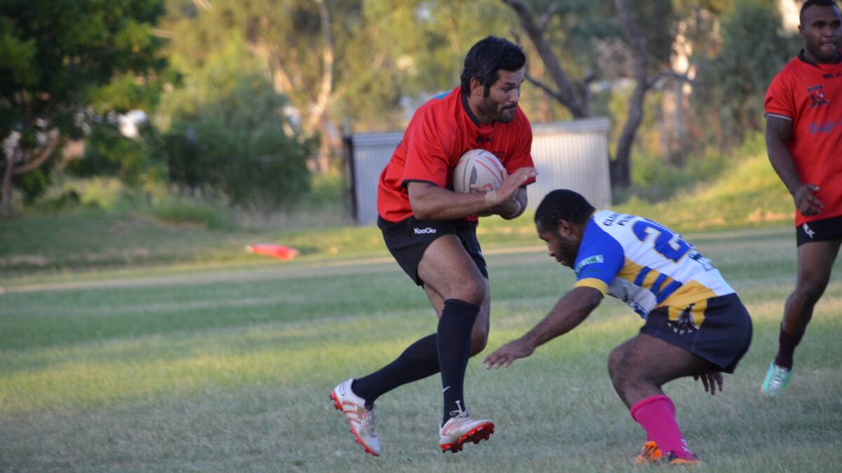 DETERMINED: Euros back Brennan English taking a hit up during the early game against Cloncurry on Saturday night.