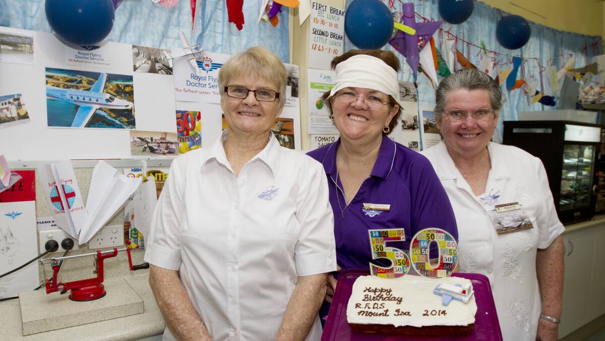 RFDS: Tuckshop ladies Margi Sporer, Ronda Llewellyn and Margaret Hill with part of the Townview best dressed premises display. 
-Picture: KATE GLOVER/ 2983