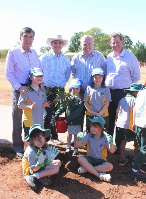 PLANTING THE FUTURE: St Joseph’s Catholic School students Cooper Fahey, Ella Palmer, Daisy Steedman, Brydie Smith and Ruby Rixon welcomed Mount Isa Mayor Tony McGrady, Mount Isa MP Rob Katter, Toyota Motor Corporation Australia district sales manager Richard Ballantyne and Bell and Moir Toyota dealer principal Lee Pulman to their annual National Tree Day to learn the value of the environment.  – Picture: HAILEY RENAULT/ 8222