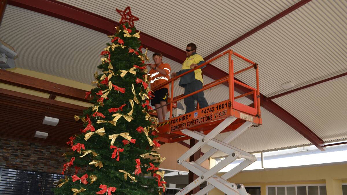 CHRISTMAS TIME IS NEAR: A Christmas tree is being assembled in the Cloncurry Community Precinct in time for the Christmas Festival.