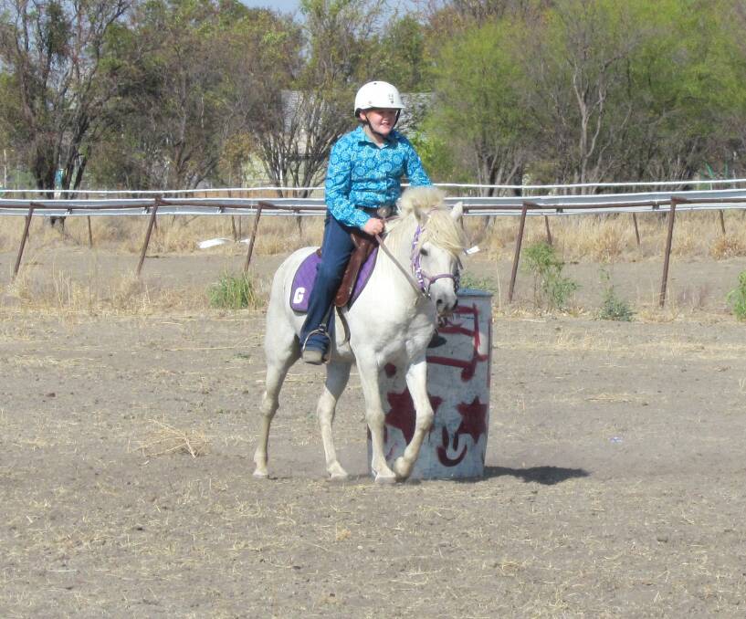 RIDER: April Dixon in action at last year’s Horse Sports and Family Fun Day in Gregory.