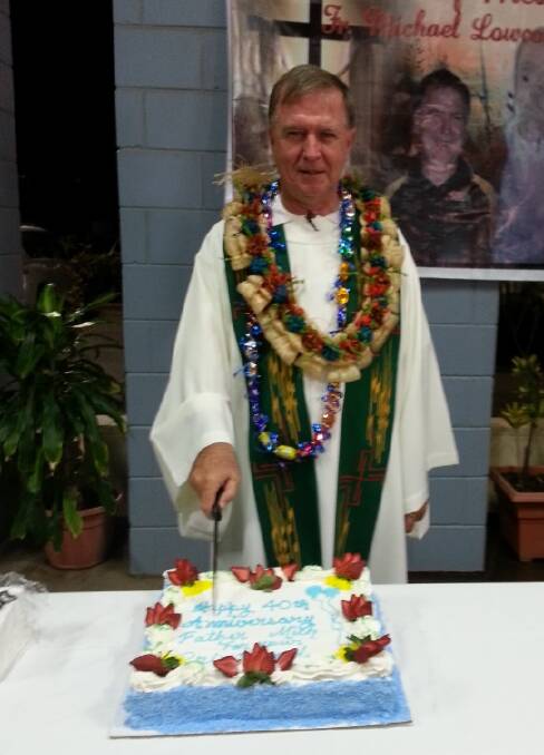 ICING ON THE CAKE: Fr Mick celebrates 40 years as a priest.