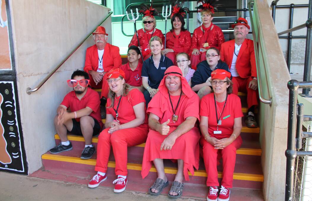 VARIETY VISIT: The wild and wacky Northern Territory Variety Bash drivers brought a smile to the faces of Mount Isa State  Special School students Kai Williams, Kayzha Hape, teacher Alex Miller, Courtnee Hensler and Emma Zevenhoven on Monday. 
– Picture: HAILEY RENAULT/ 8230
