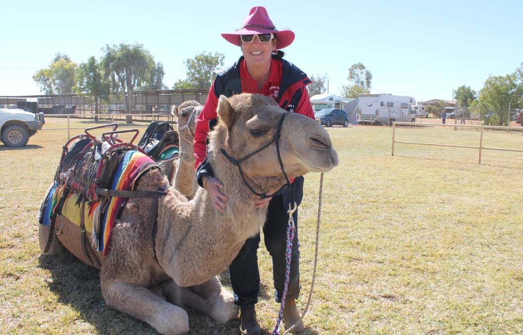MEET GINGER: Camel handler Diane Gooley, offers camel rides at the Boulia Cup at the weekend. 