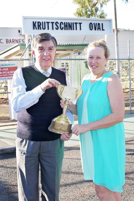 Mount Isa mayor Tony McGrady with councillor Kim Coghlan and a replica of the coveted Melbourne Cup.