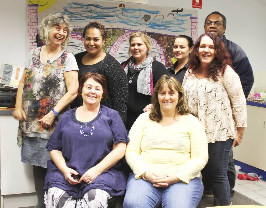 ART FOR SUPPORT: (From back left ) Brisbane-based art therapist Maggie Wilson flew to Mount Isa last week to show Anglicare’s Mount Isa staff Saberina Gassio, Renaee Gattera, Amanda McDonald, Leeanne Harris, Sakiusa Reguhamada, (back row) Judy Marty and Deb Mellor how to inject art into their respite and care programs. – Picture: HAILEY RENAULT/8225