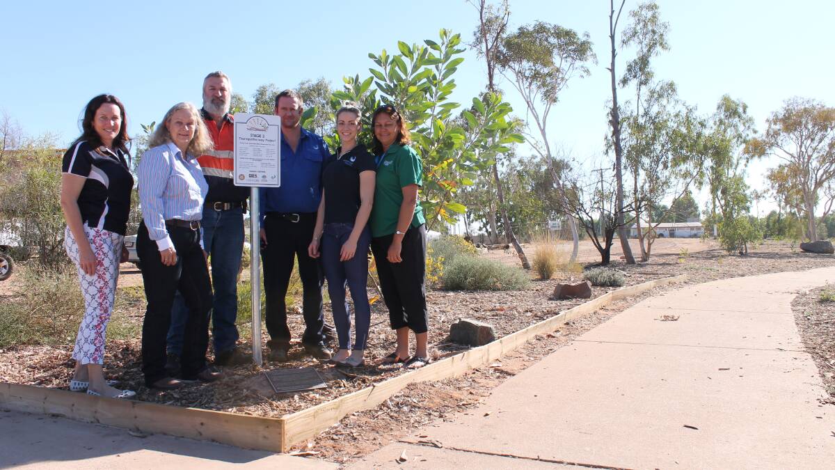  Cr Kim Coghlan, Rotarian Alison Bohannan, Rotary Club Mount Isa South West president Darren Campi, Southern Gulf Catchments community environment project officer Mick Brady and Victoria Taylor and MICRRH project officer Kaye Smith officially opened stage 3 of Tharrapatha-way last Friday. 