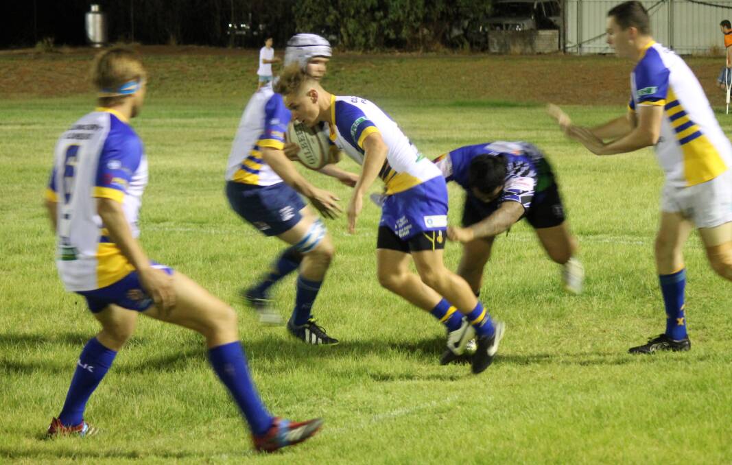PLAYMAKER: Cloncurry’s Josh Elliot attempts to break the Keas defence at Mount Isa’s Rugby Park.