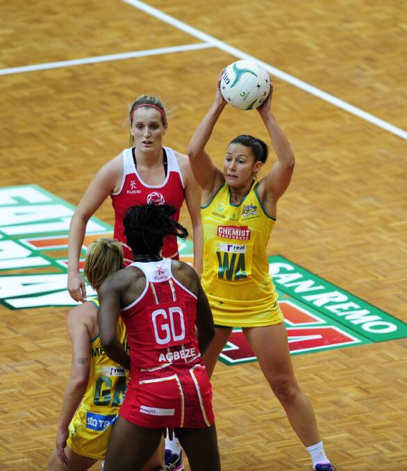 ALERT: Australian Diamonds player Madi Robinson looks to pass against England in the international Test series at the AIS Arena in Canberra on Wednesday night. 