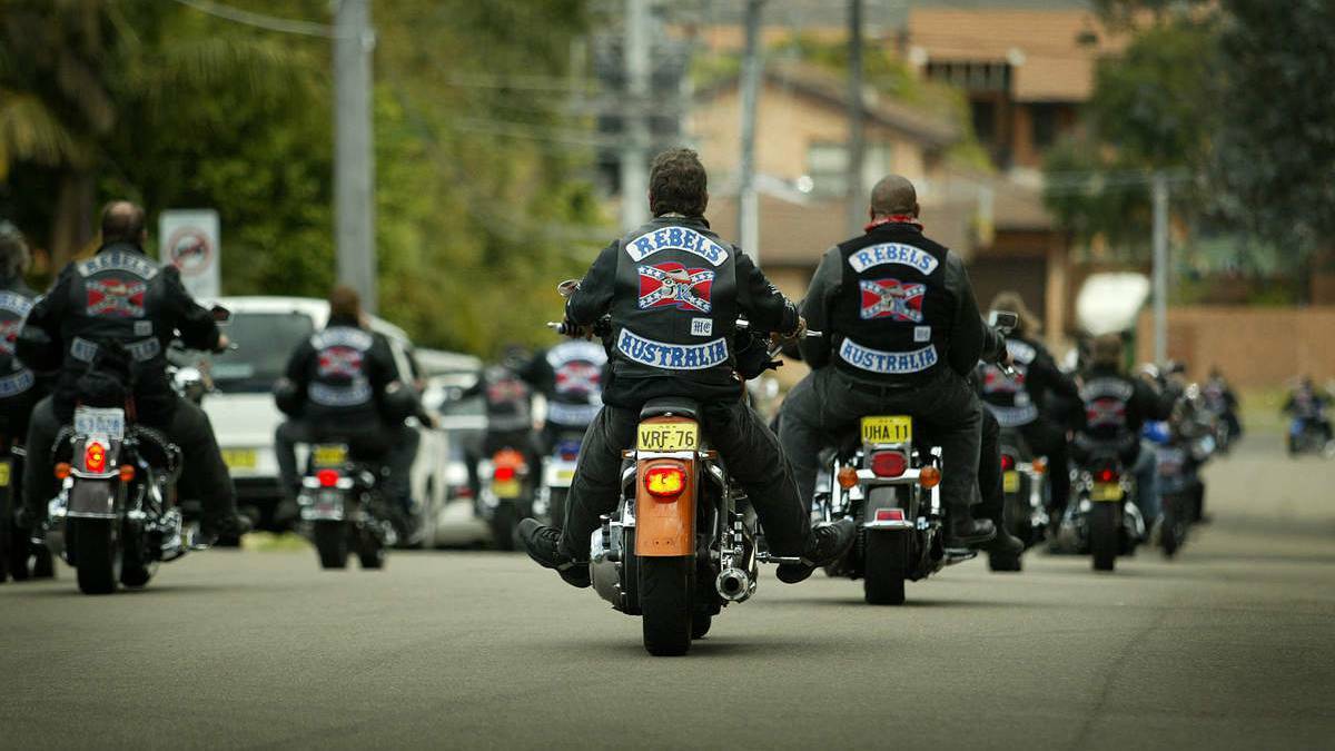 TAKEN SERIOUSLY: A Mount Isa Rebels member was stopped by four police officers in Coles last Thursday because of the motorcycle club shirt he was wearing. 