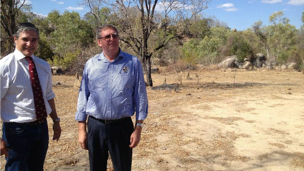 DIRTY: State member for Mount Isa Robbie Katter and Etheridge Shire Mayor Will Attwood inspect the site of the proposed Charleston Dam on the Delaney River near Forsayth.