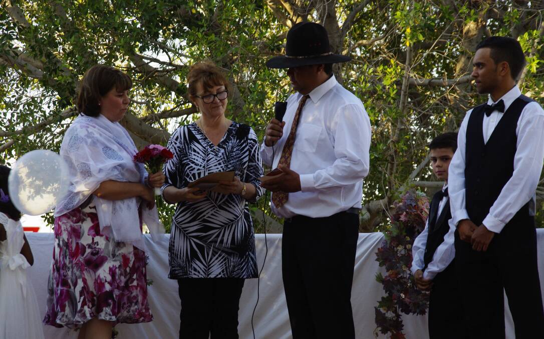 MAN AND WIFE:  Kalkadoon man Shaun Wilde and his bride Lisa Briscoe take their marriage vows  administered by celebrant Beverley-Ann Jones. 
